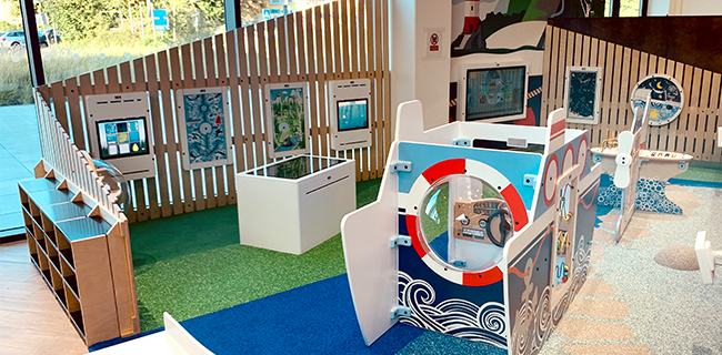 Kinderhoek als onderdeel van een tuincentrum Kinderhoek als onderdeel van het winkelinterieur